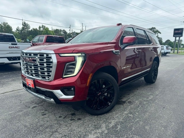 2026 GMC Yukon Denali in Volcanic Red Tintcoat — front three-quarter view