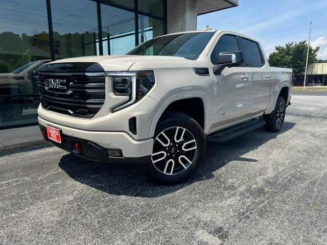 2026 GMC Sierra 1500 AT4 in Coastal Dune — front three-quarter view